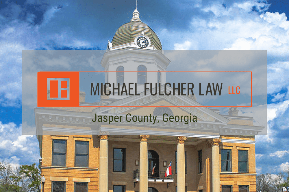 Michael Fulcher Law Criminal lawyer Serving Jasper County Georgia portrayed by the Monticello Georgia Courthouse.